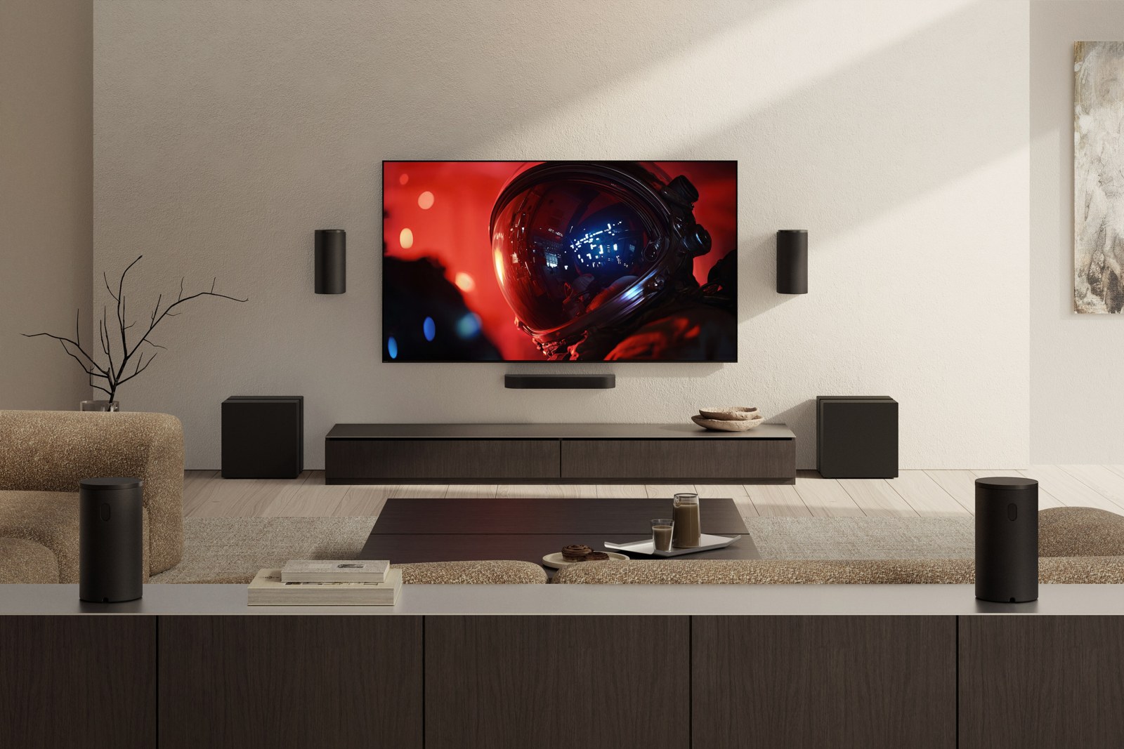 Sony BRAVIA television and Theater Trio speakers in a living-room setup.